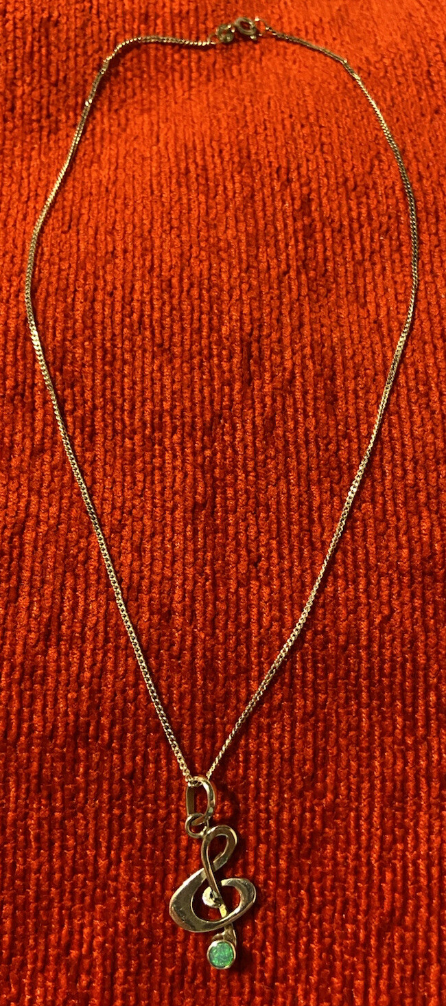 Silver Treble Clef Pendant With Opal Stone On A 16”/40cm Silver Chain.