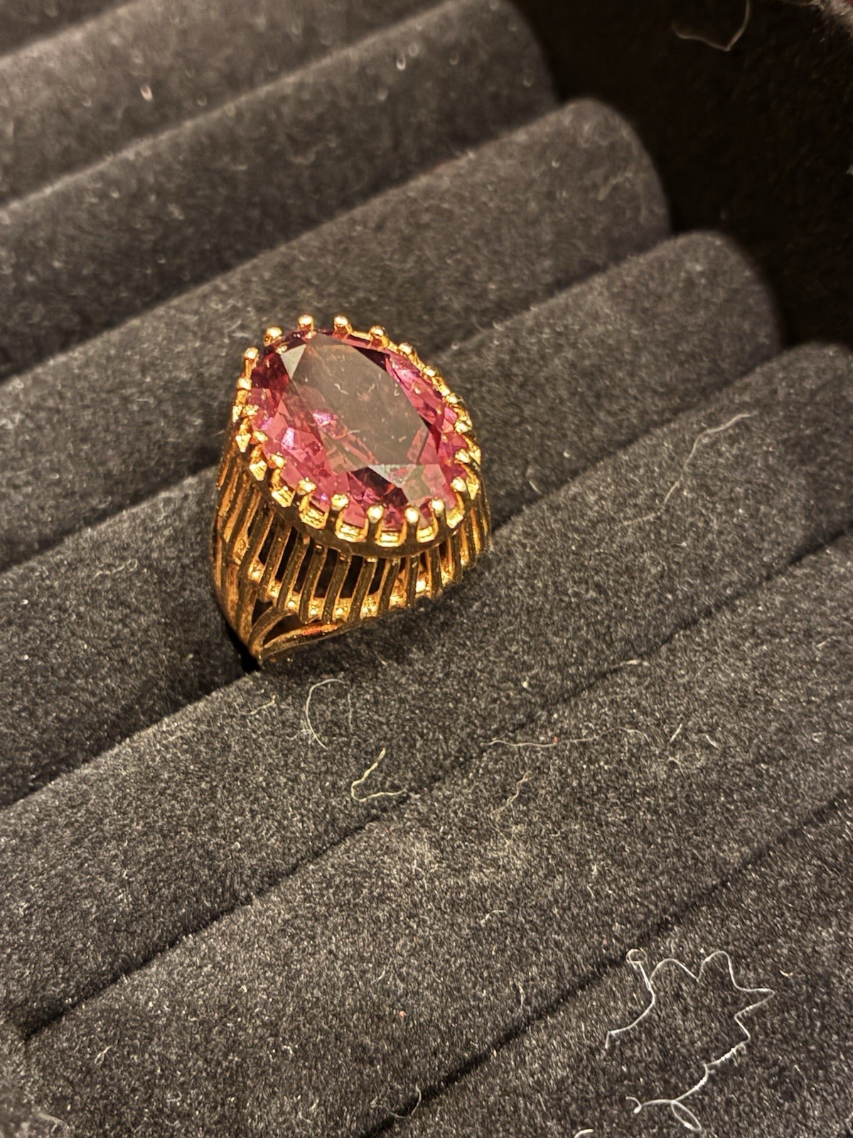yellow gold cocktail ring, large red purple stone in prong setting 7.5-8.0