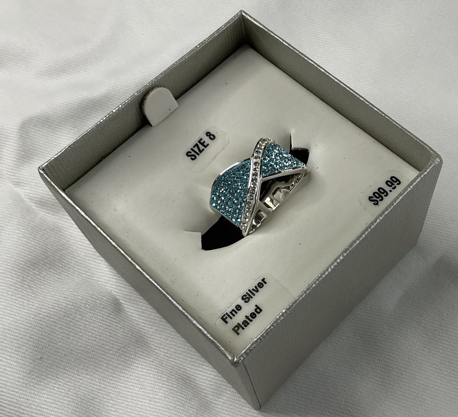 Eternal Treasures Women’s Size 8 Silver Plated Crystal Blue Crossover Ring