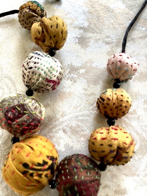 Multicolored fabric and cord adjustable necklace (14″ inch drop)