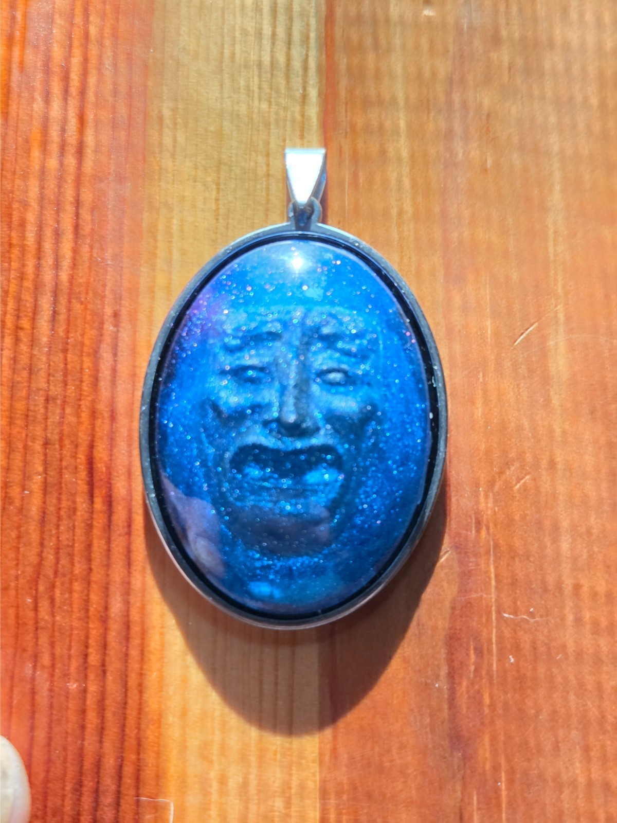 Handmade Blue Resin Face Pendant – Glitter Cabochon in Stainless Oval Setting