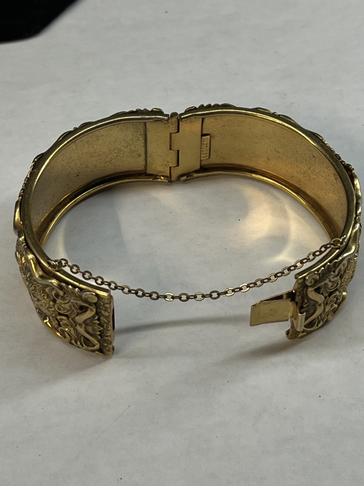Lisner Gold Tone Ornate Carved Cuff Hinged Bracelet Floral Safety Chain Large