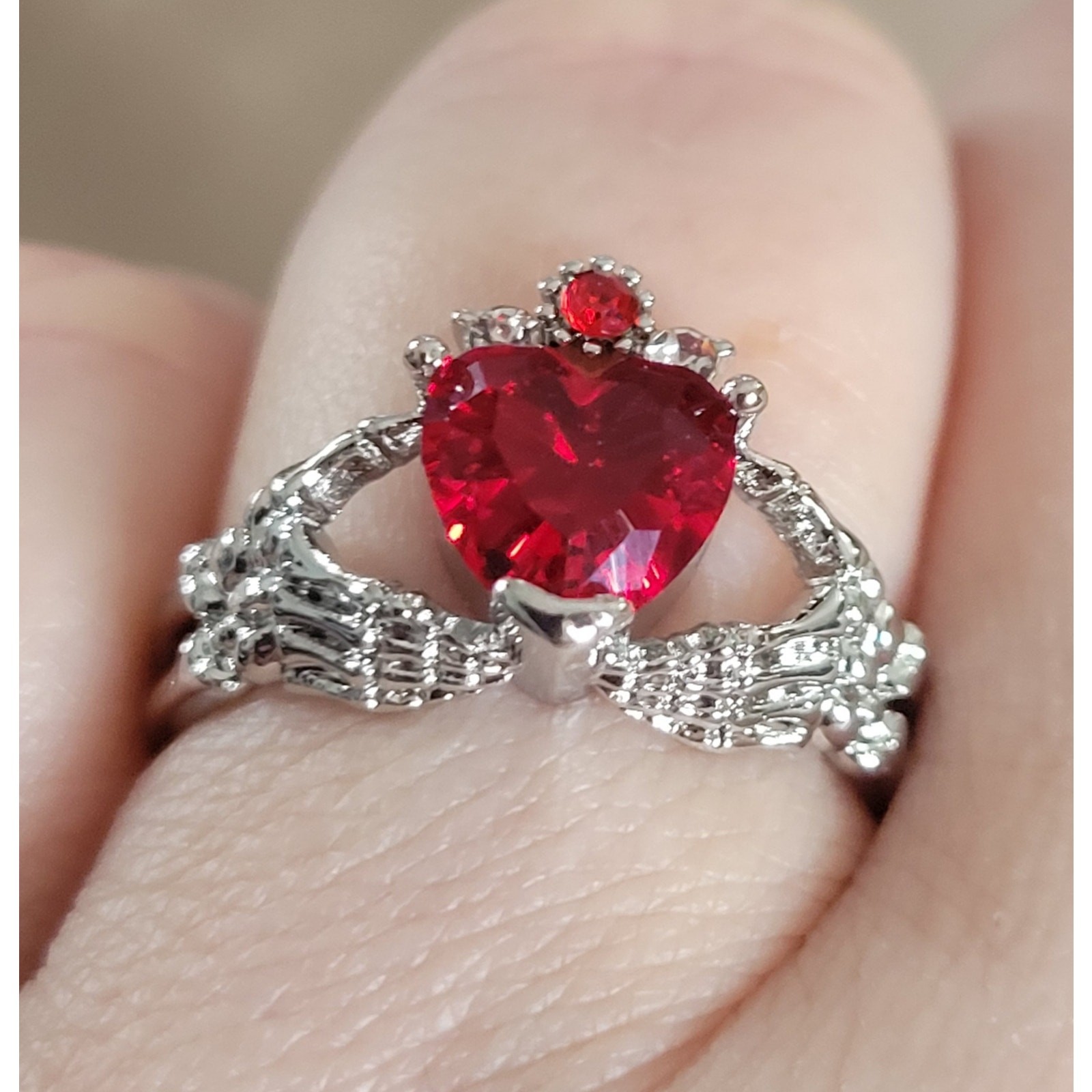 Size 7 gothic claddagh ring, skeleton hands holding red crystal heart