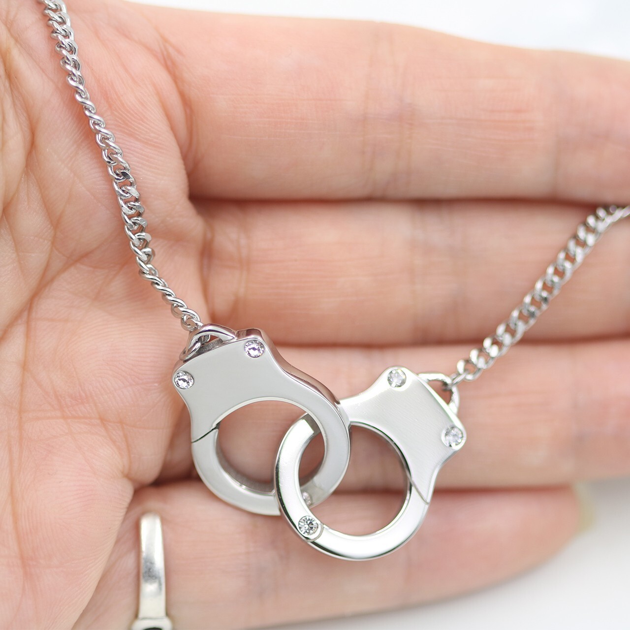 Handcuffs pendant Necklace interlock stainless steel clear crystal By Controse