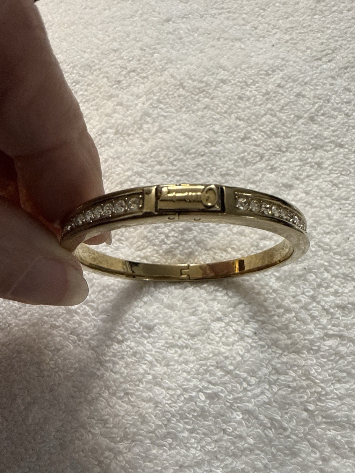 Fossil Brand Gold tone latch closure bangle with white stones