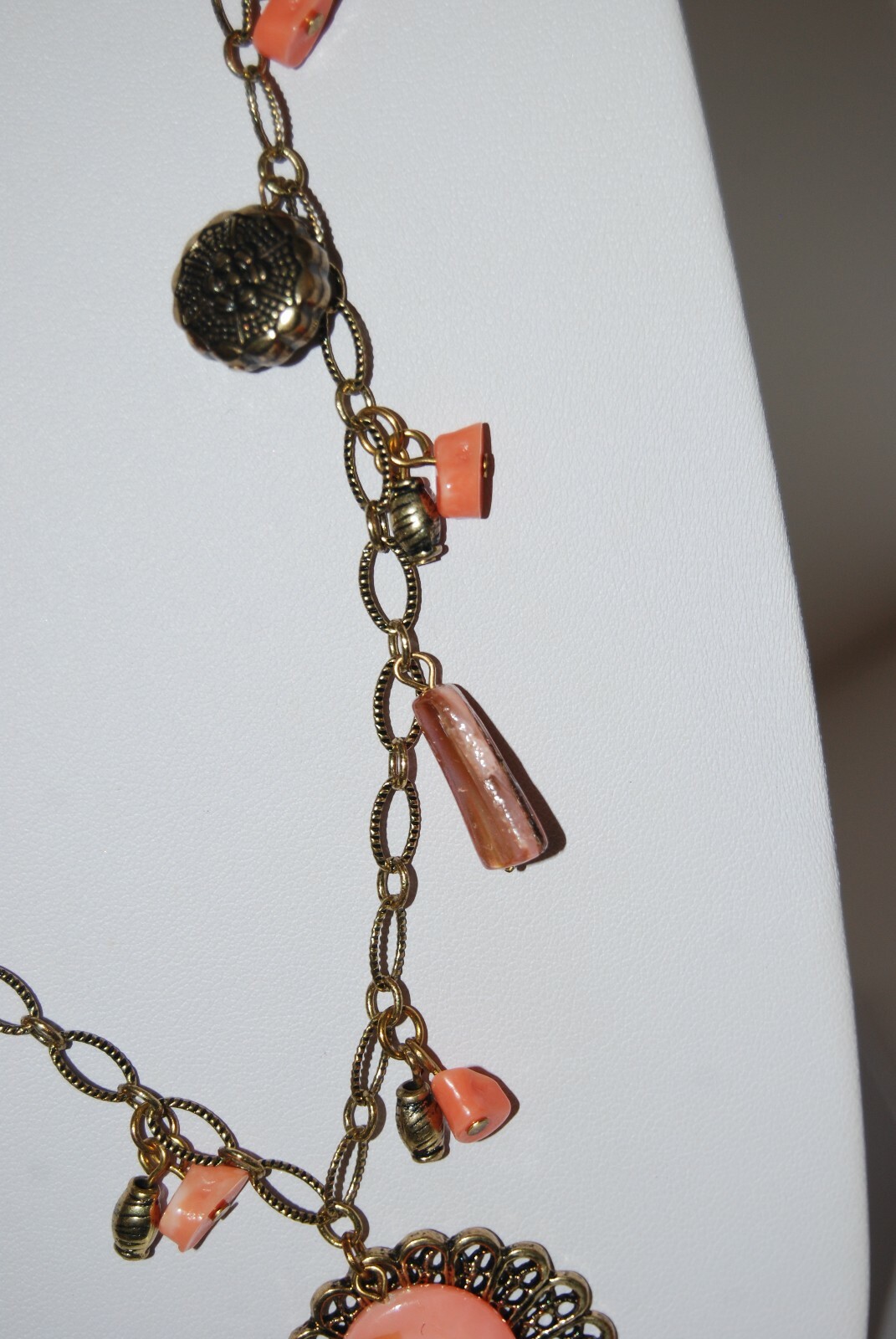 Gold Toned Metal Chain With Peach Color Stones & Charms Statement Long Necklace