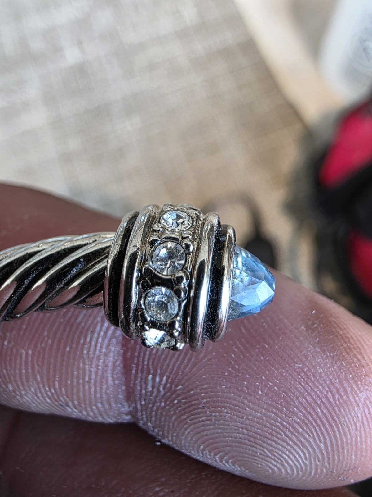 Silver Tone Twisted Rope Cable Cuff Bracelet w/ Bezel Set Blue Crystal Ends