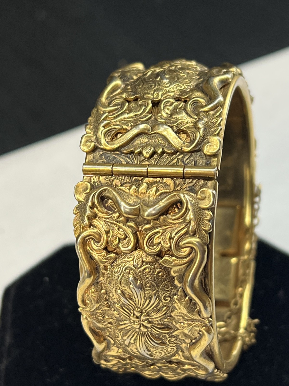 Lisner Gold Tone Ornate Carved Cuff Hinged Bracelet Floral Safety Chain Large