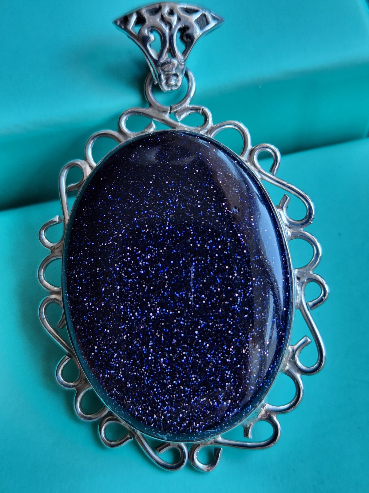 BLUE GOLDSTONE STERLING SILVER PENDANT, 17 GRAMS