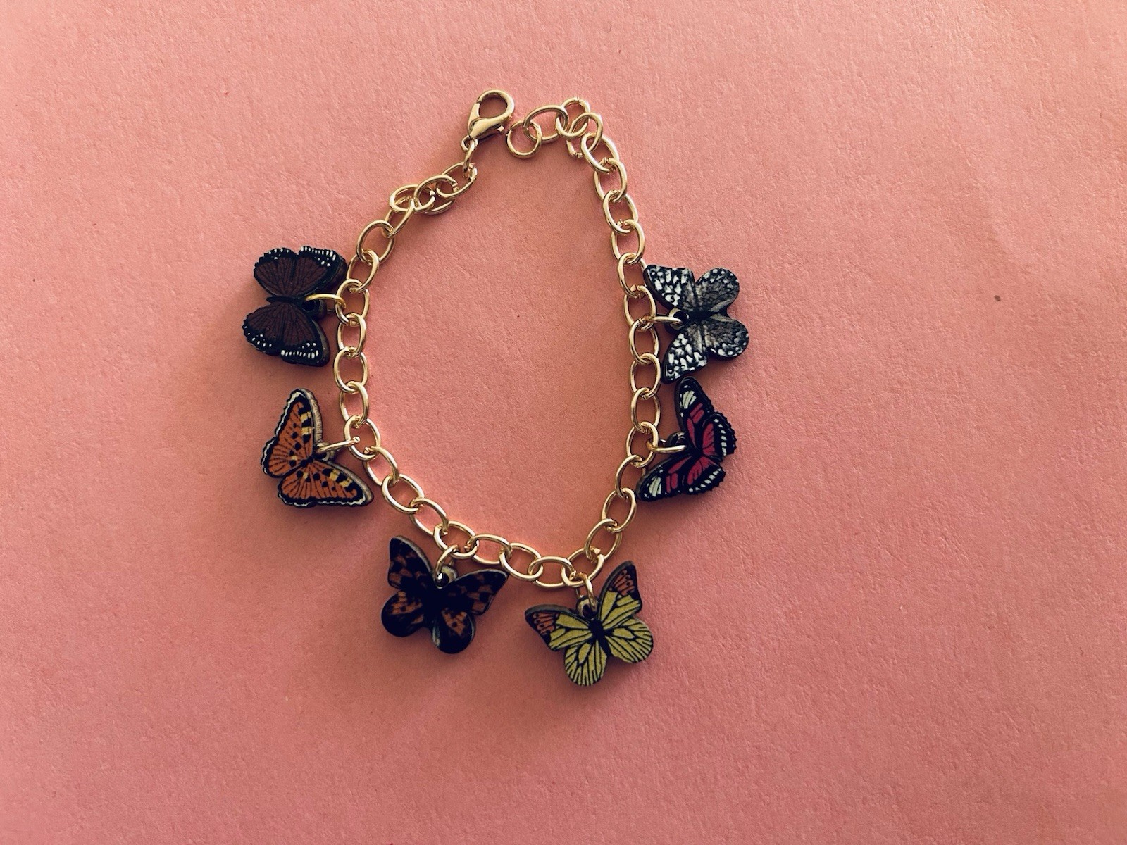 Multicolor wooden butterfly charm bracelet in 7.8” adj gold tone chain new!