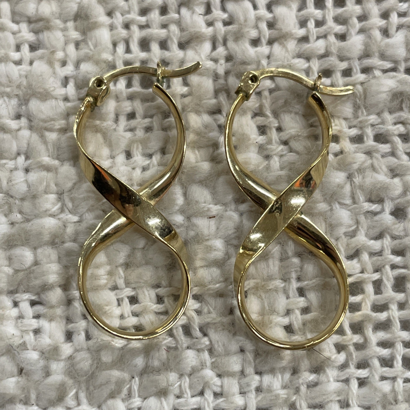 Gold Toned ATI BR TH Twisted Infinity Hoop Earrings
