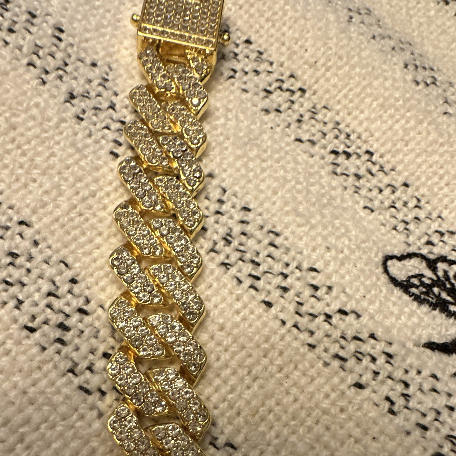 Gold Tone Cuban Link Chain Bracelet with Pavé Setting and Box Clasp Closure