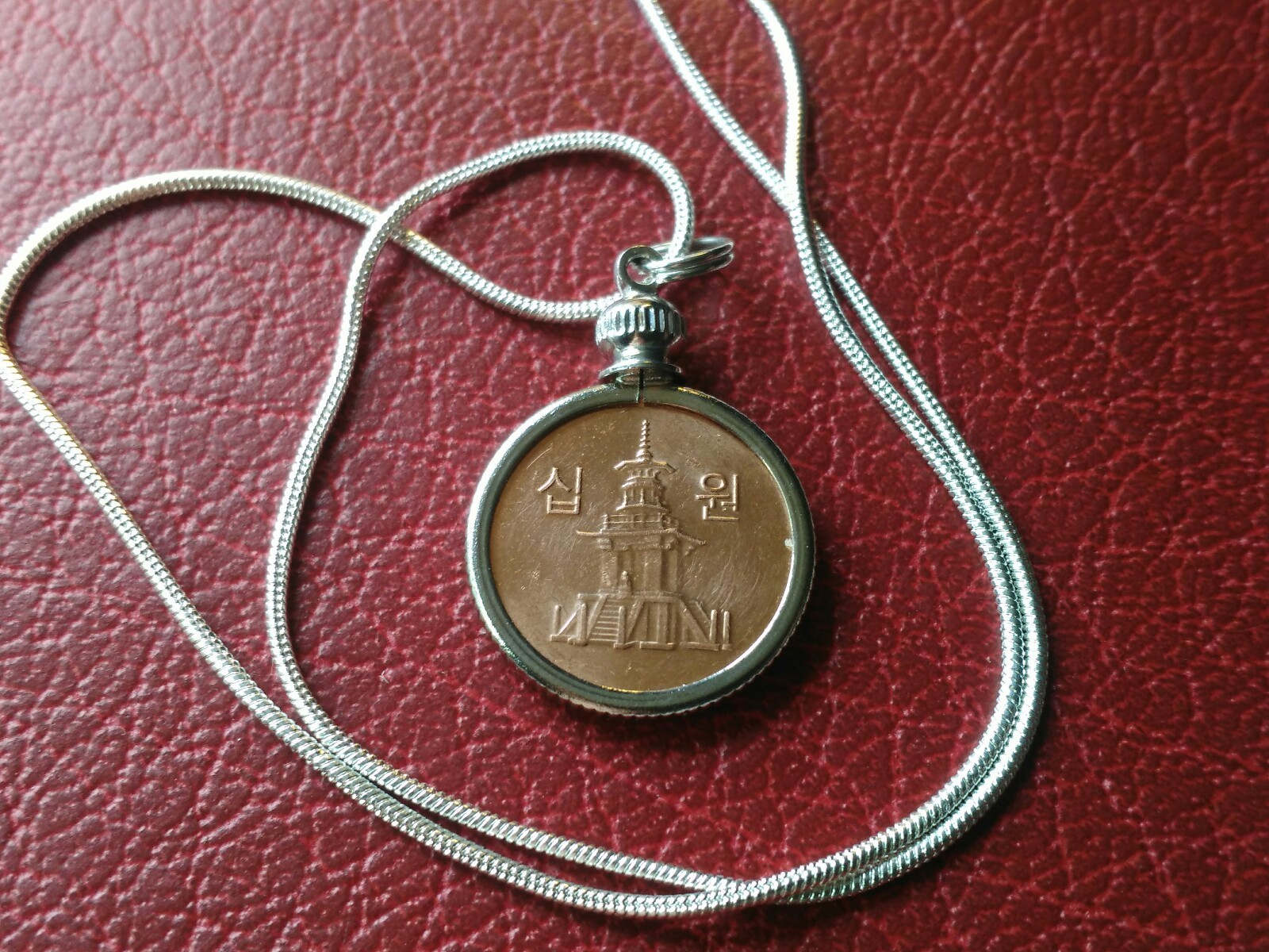 2008 South Korea 10 Won Copper Pendant on an 18″ White Gold Filled Round Chain
