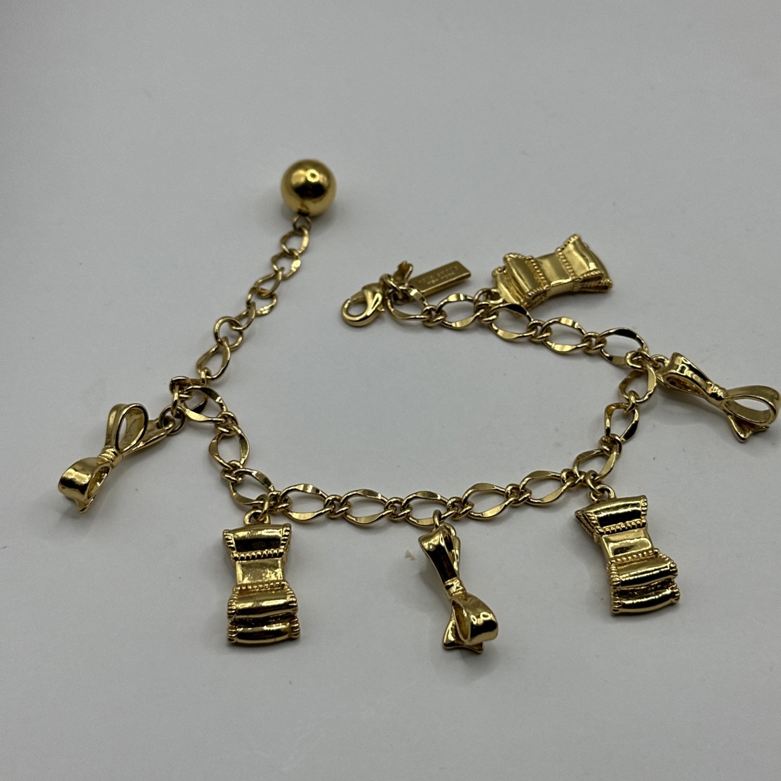 Adorable Kate Spade Charm Bracelet with Bows Gold Tone 7-8.5”