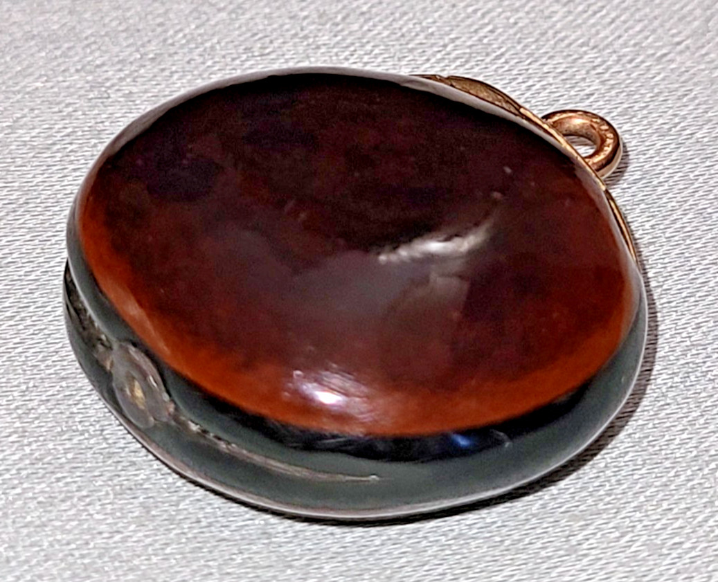 Antique Victorian polished mucuna / sea bean pendant, gold tone bail
