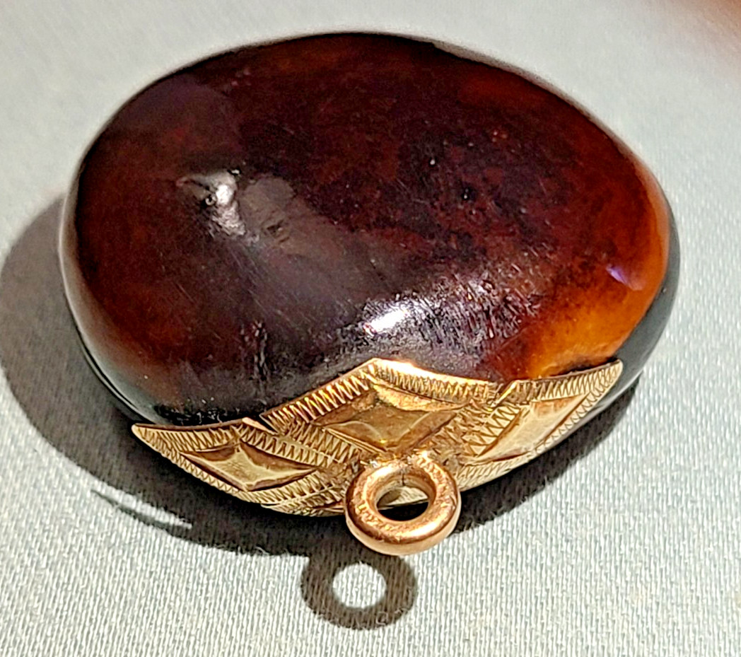 Antique Victorian polished mucuna / sea bean pendant, gold tone bail