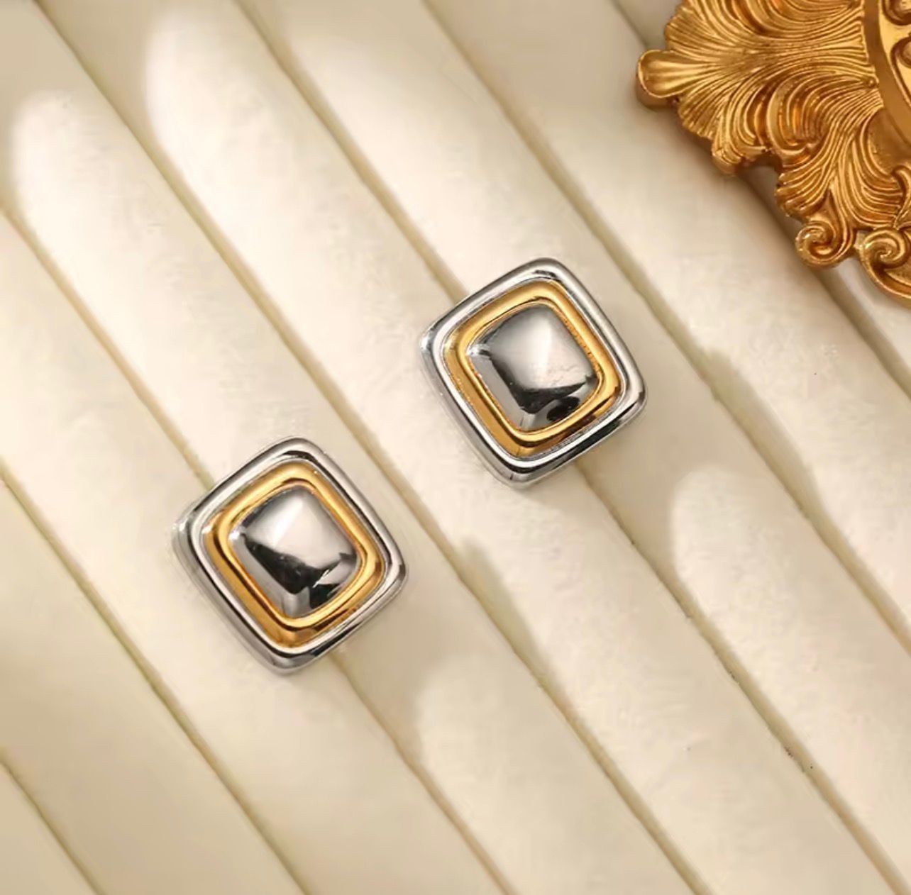 earrings, for women a sleek open-frame design in a sophisticated gold and silver