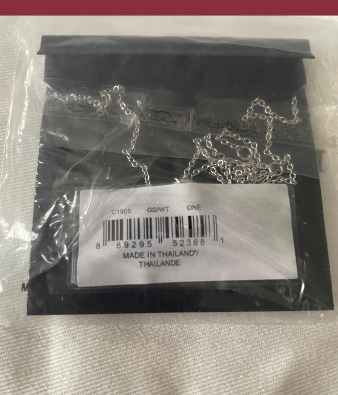 Silver , still in the packaging Coach necklace