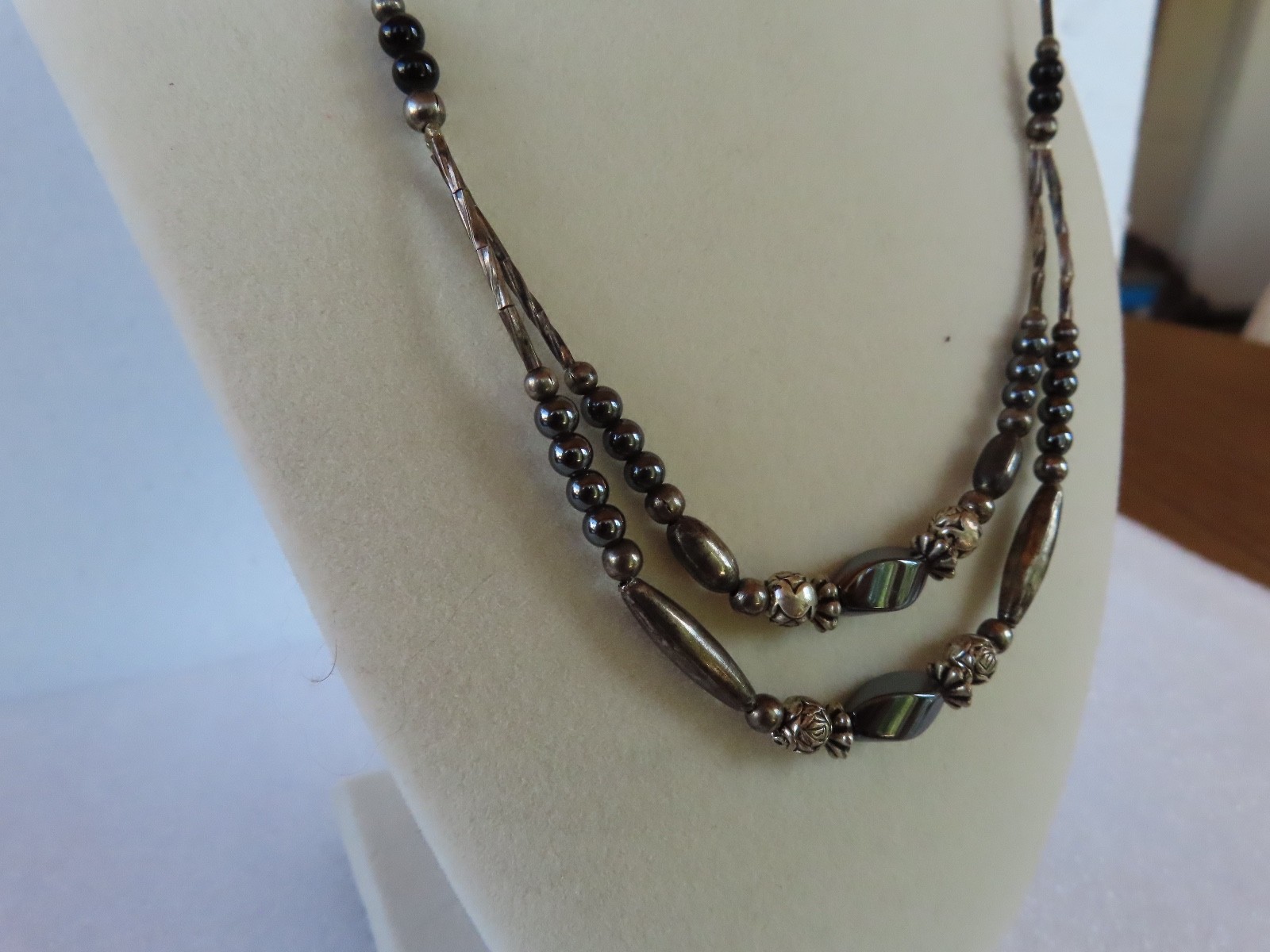 Black Beaded necklace, measures 18″ about.