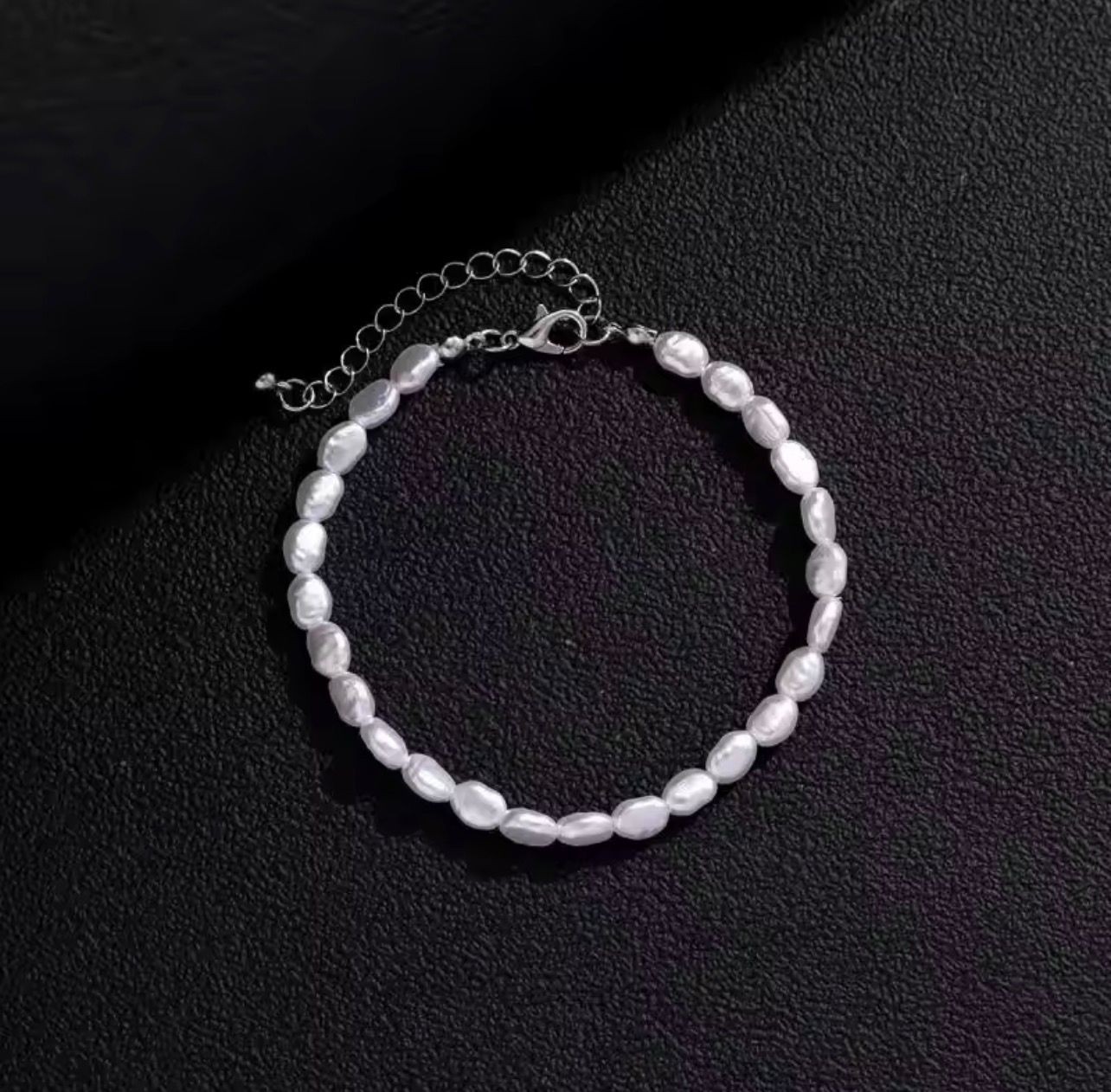 A beautiful white bracelet designed for women and suitable for everyday wear.