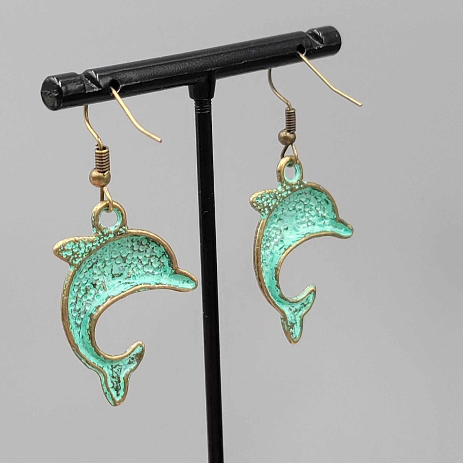 Dolphin Beach Sea life Pierced Earrings Bronze tone Green wash Dangle 1.25″