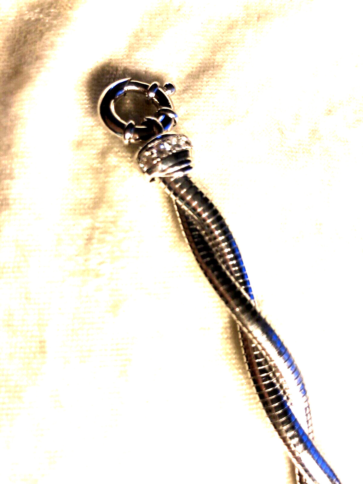 DIAMONIQUE CZ ITALIA TUBOGAS TWISTED SS BRACELET, SIZE SM/MED (M4616-42)