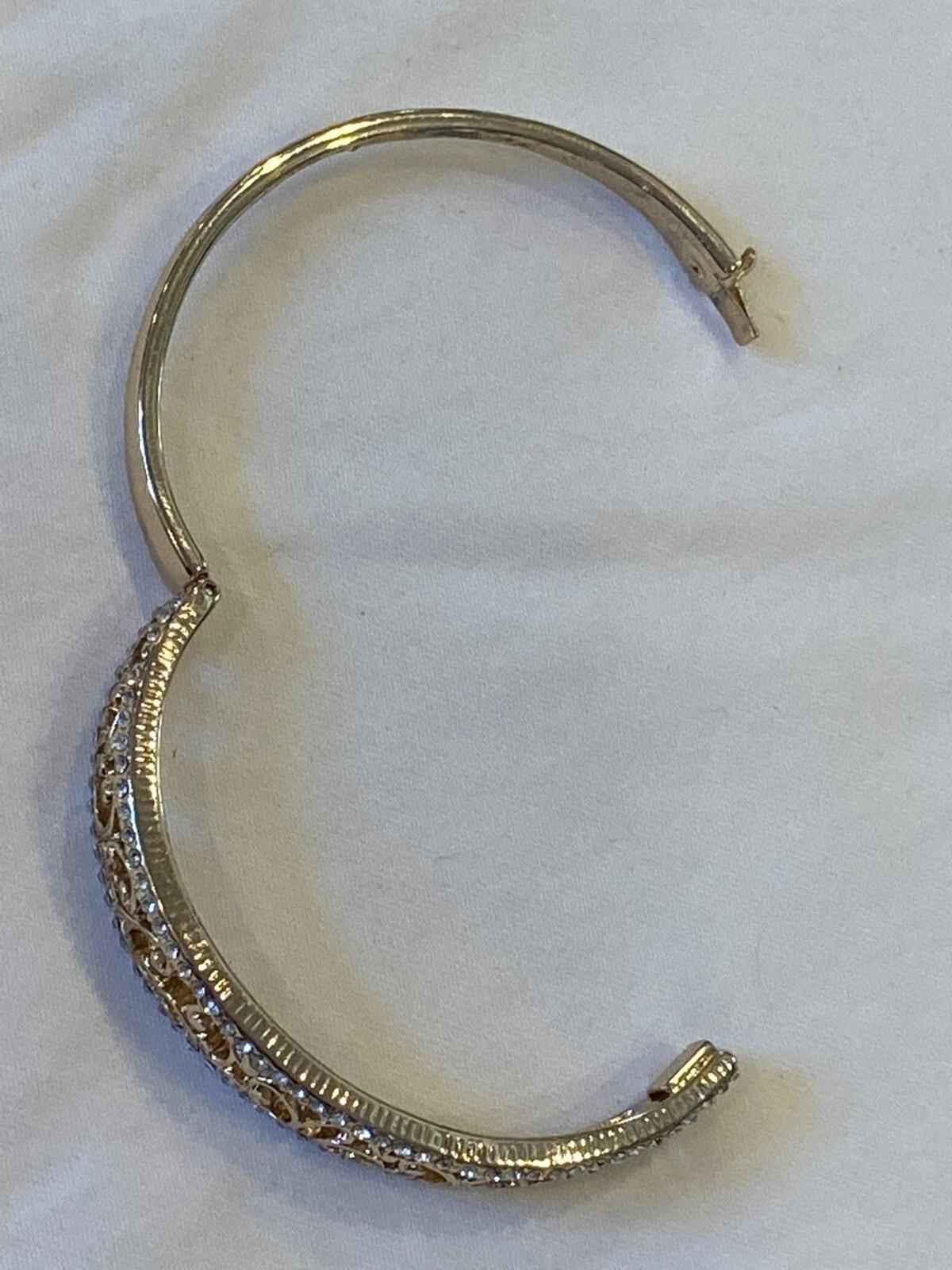 VTG Napier Bangle Hinged, Push-button clasp; Filigree Center lined w/rhinestones