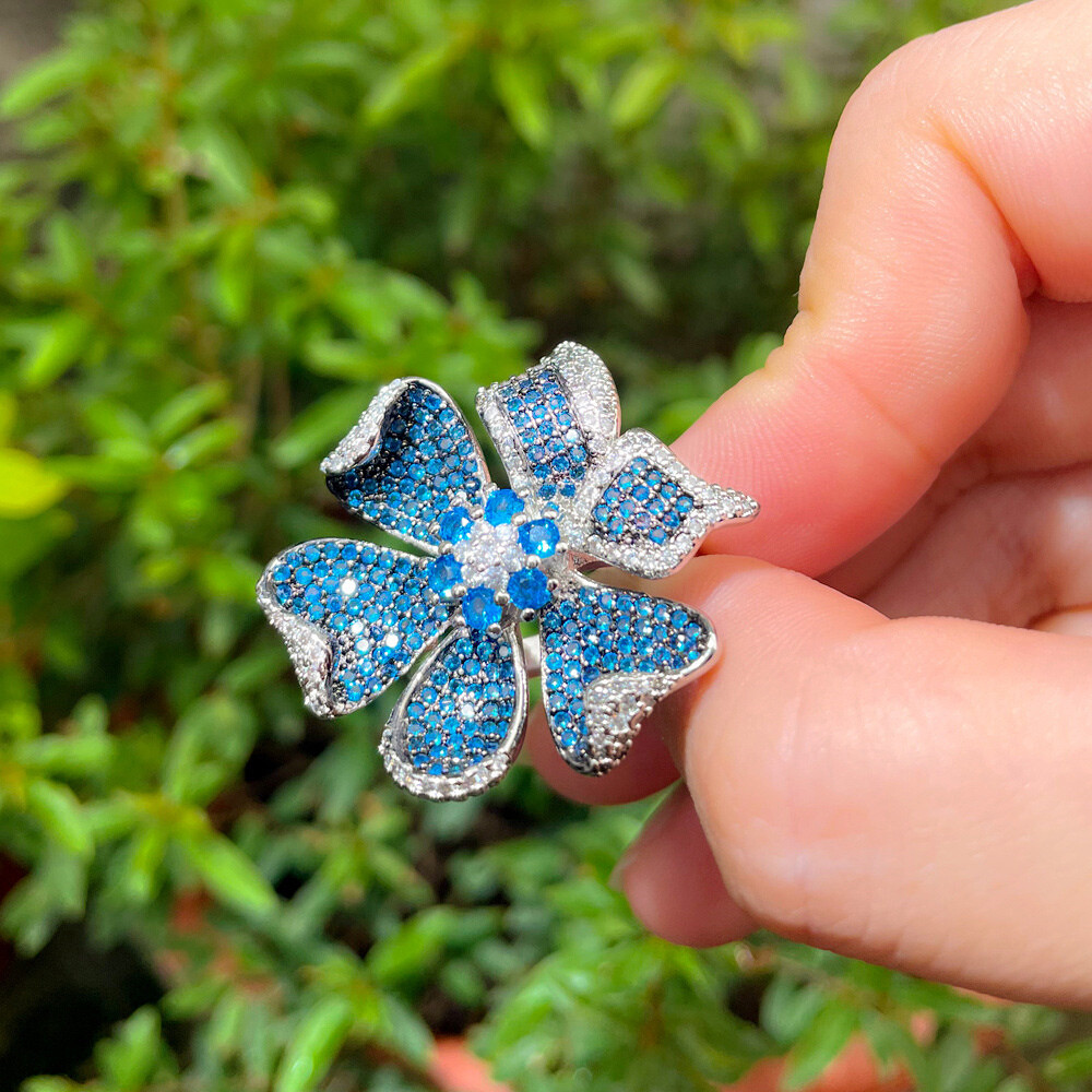 Adjustable 3D Geometric Flower Pave Setting Blue Cubic Zirconia Engagement Ring