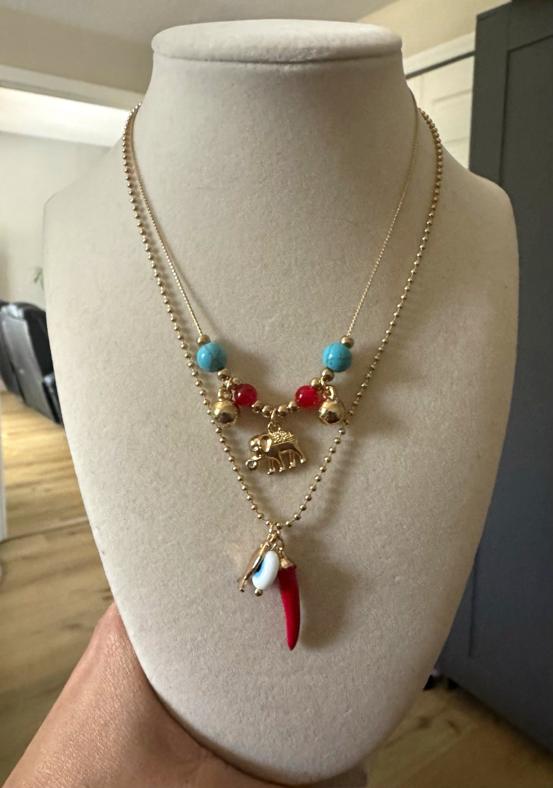 Gold Tone Layered Chain Necklace w/ Elephant Charm, Horn/Tooth Pendant, Beads