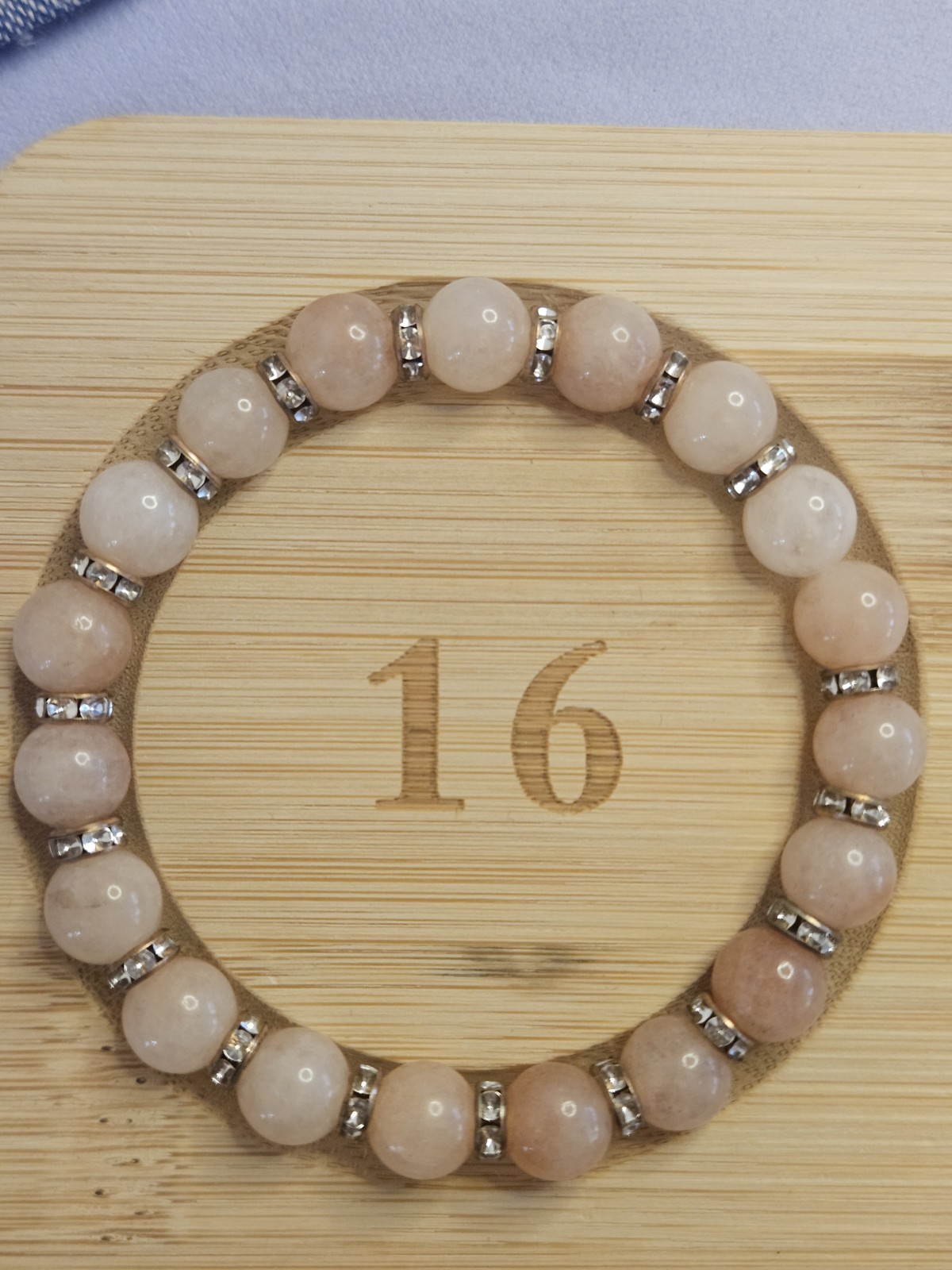 Pink Sunstone 8mm Round Beaded Stretch Bracelet w Golden Rhinestone Spacer Rings