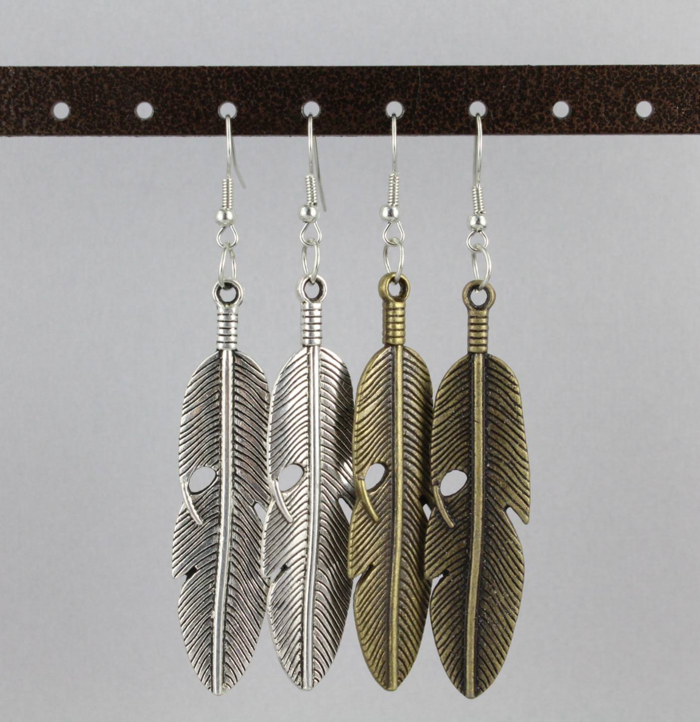 Silver feather earrings dangle metal feather textured 3.25″ long