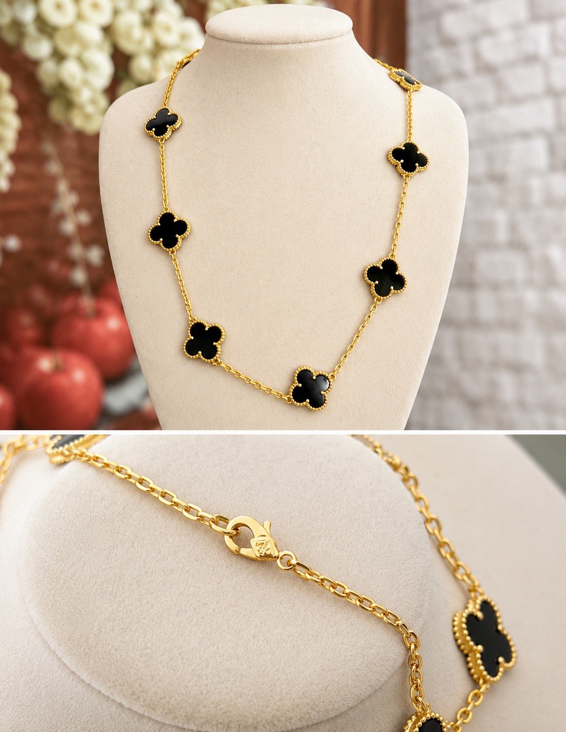 Gold tone black flower necklace