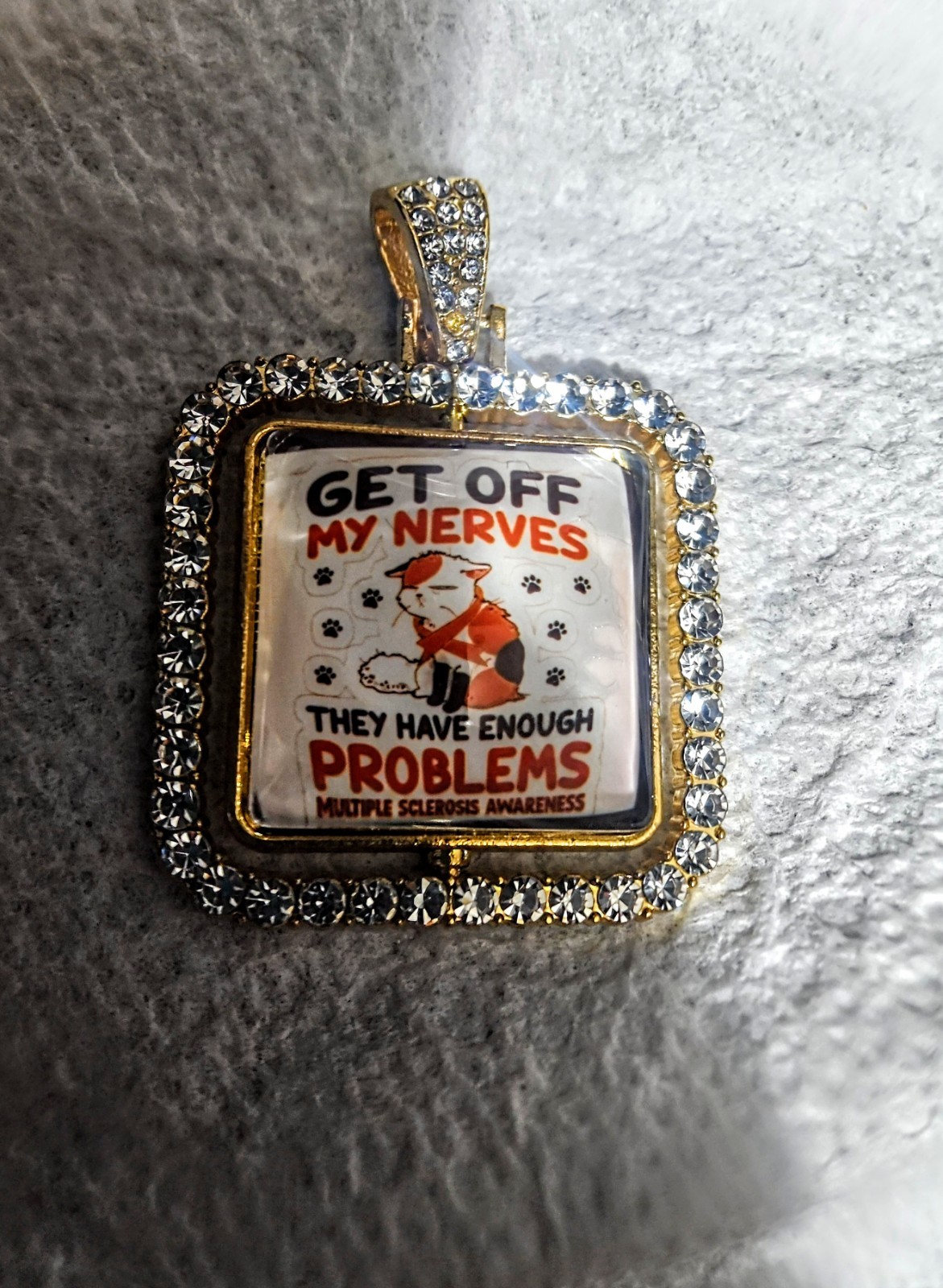 Square White Crystal Pavé Border Charm Pendant, Awareness, “GET OFF MY NERVES”