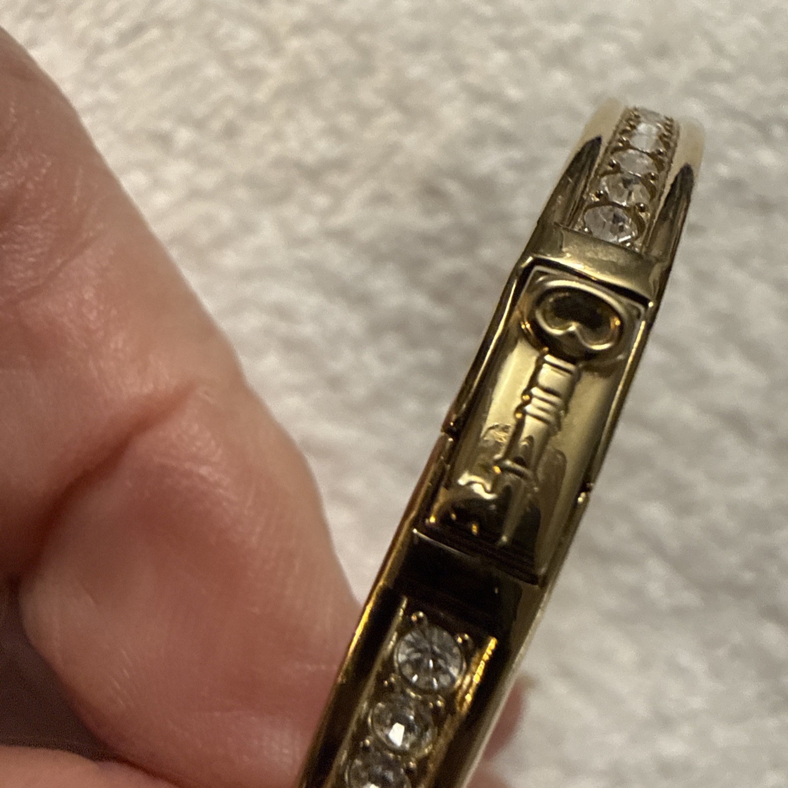 Fossil Brand Gold tone latch closure bangle with white stones