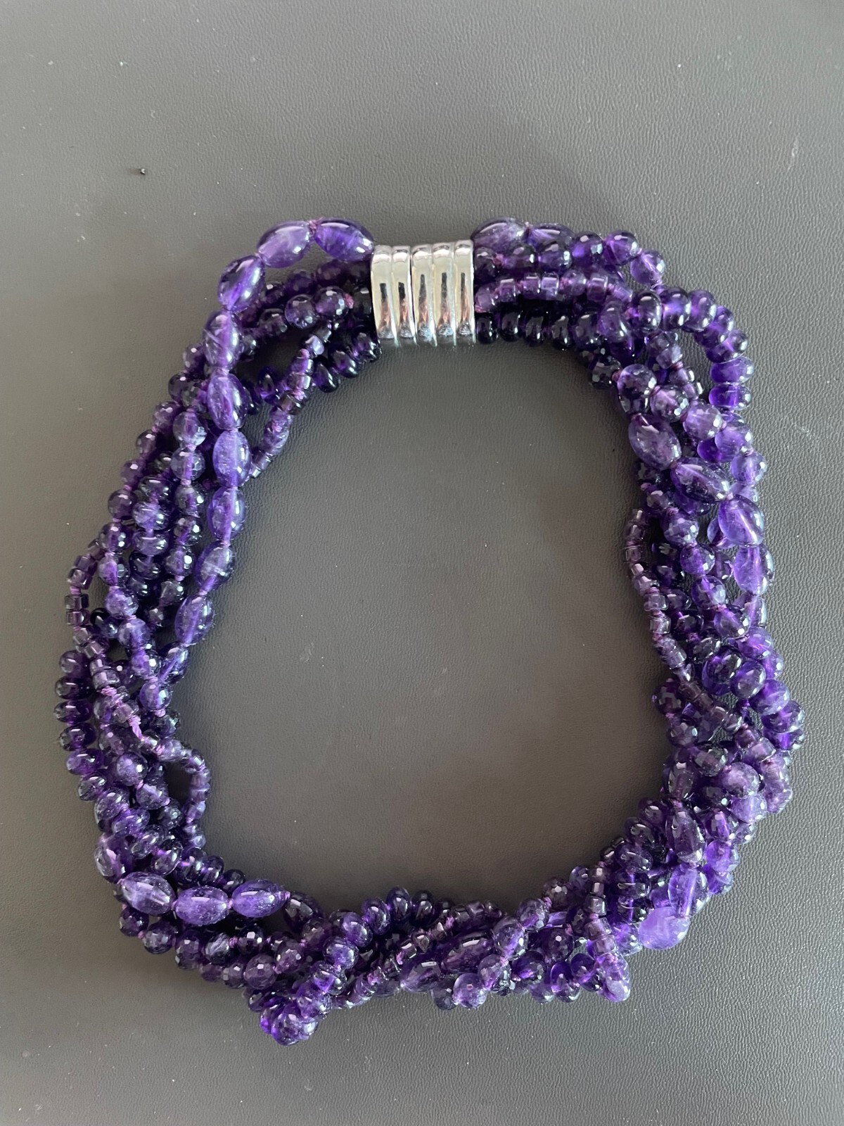 Six strand amethyst colored choker, silver-tone magnetic clasp, various shapes