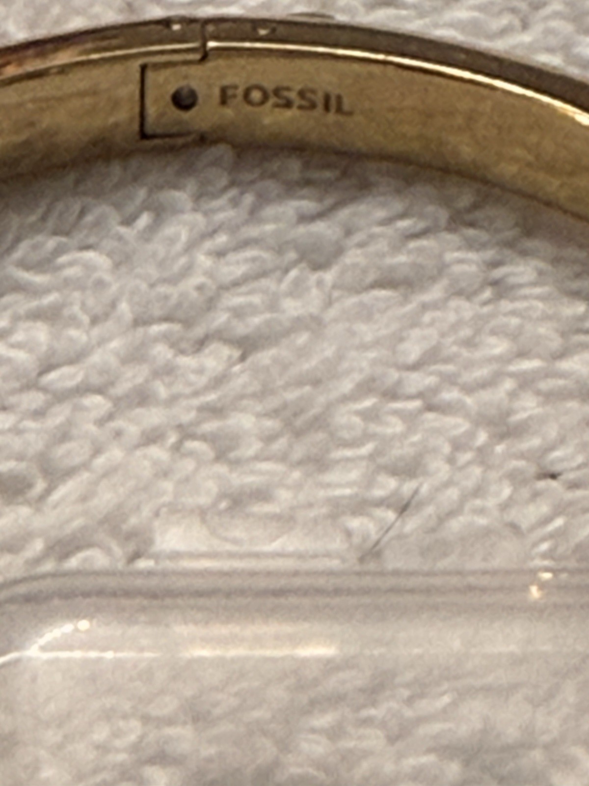 Fossil Brand Gold tone latch closure bangle with white stones