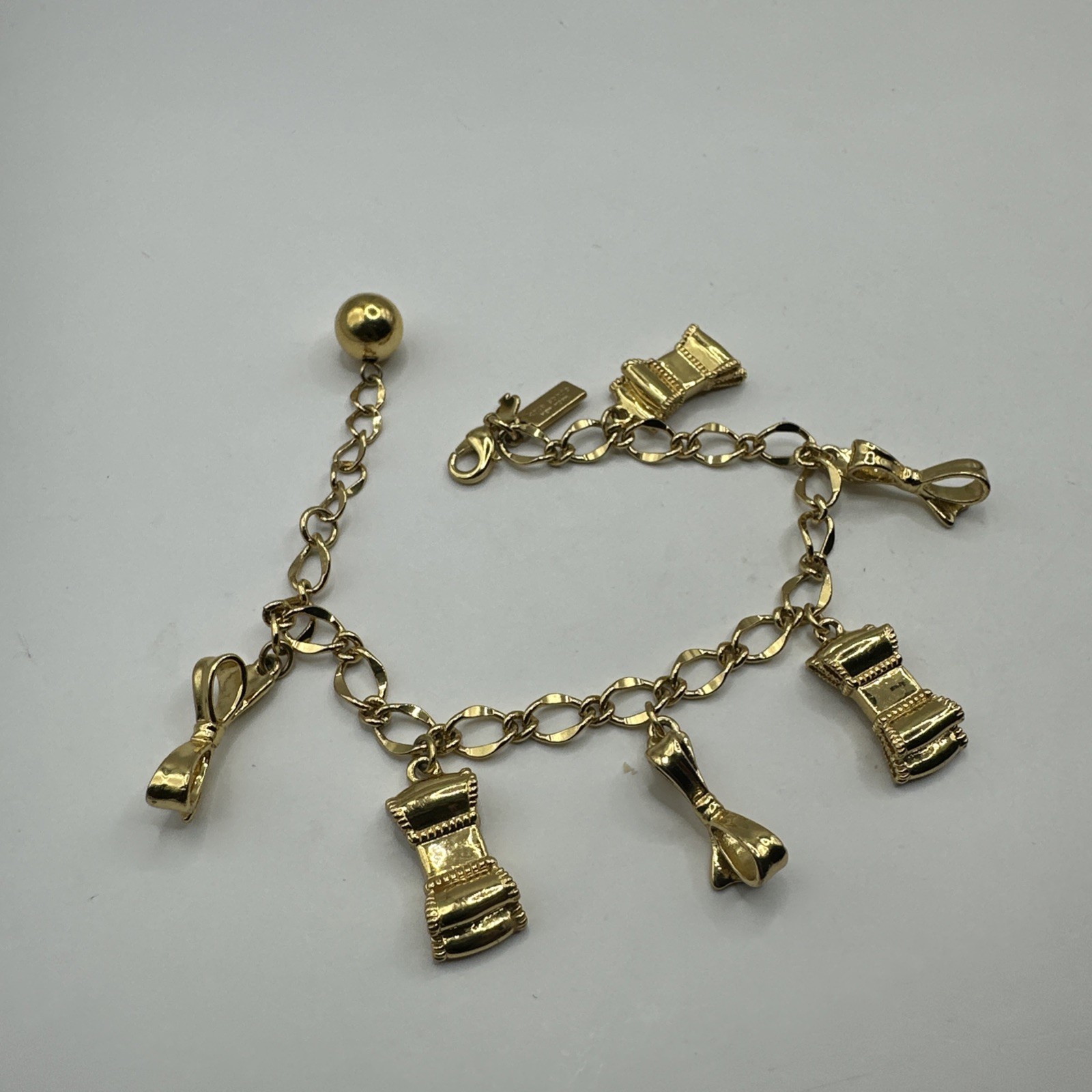Adorable Kate Spade Charm Bracelet with Bows Gold Tone 7-8.5”