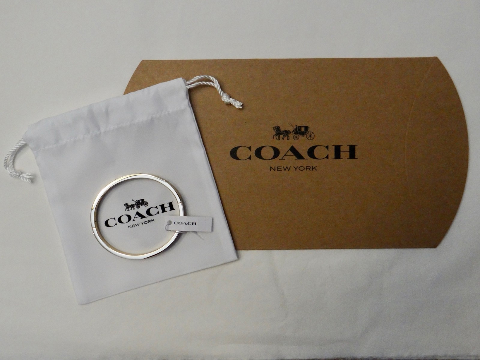 New! Coach Signature Hinged Bangel in Gold