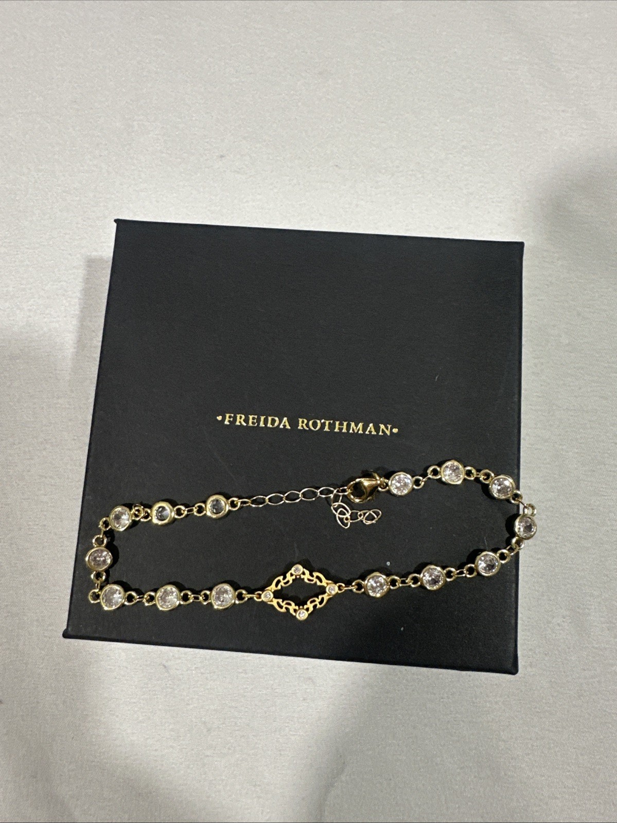 NEW Freida Rothman Brass Bezel Cubic Zirconia Bracelet in Gold Finish