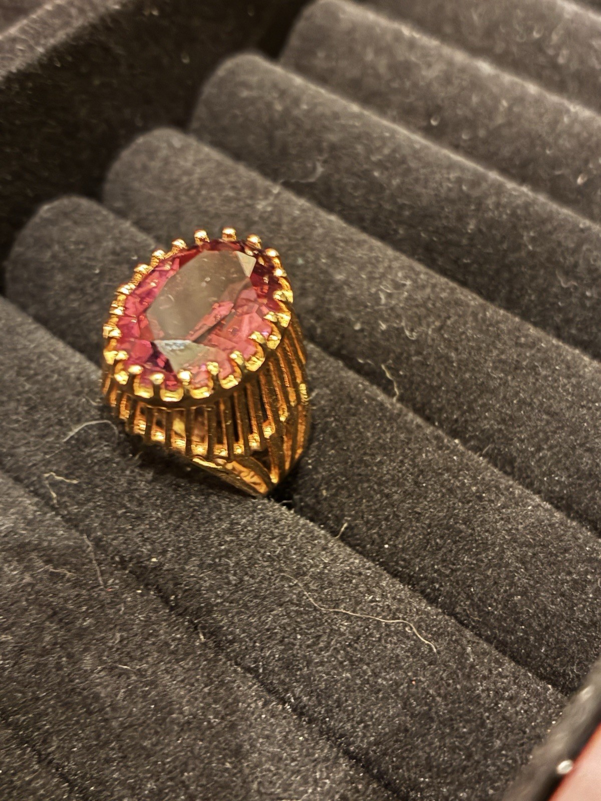 yellow gold cocktail ring, large red purple stone in prong setting 7.5-8.0