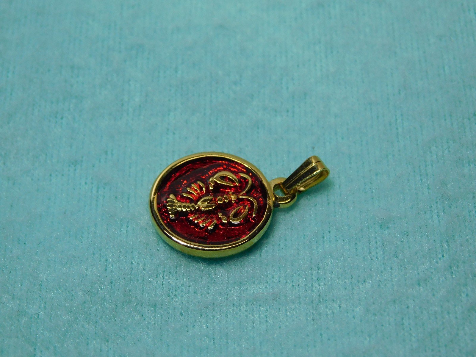 H.Stern 3/4″ Red (zodiac) Cancer Pendant in Very Good Cond.