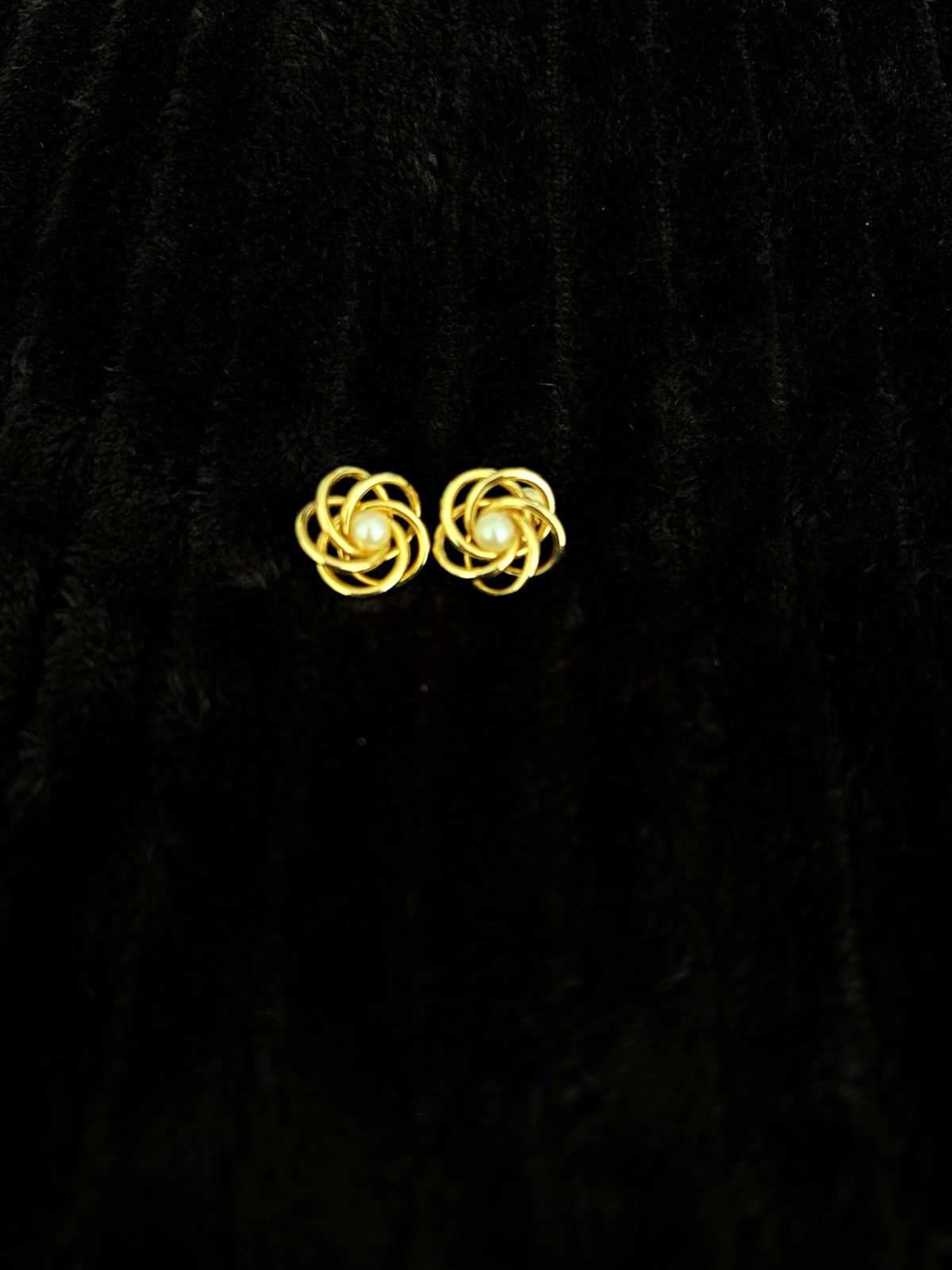 Vintage Monet Gold Pearl Love Knot earrings.