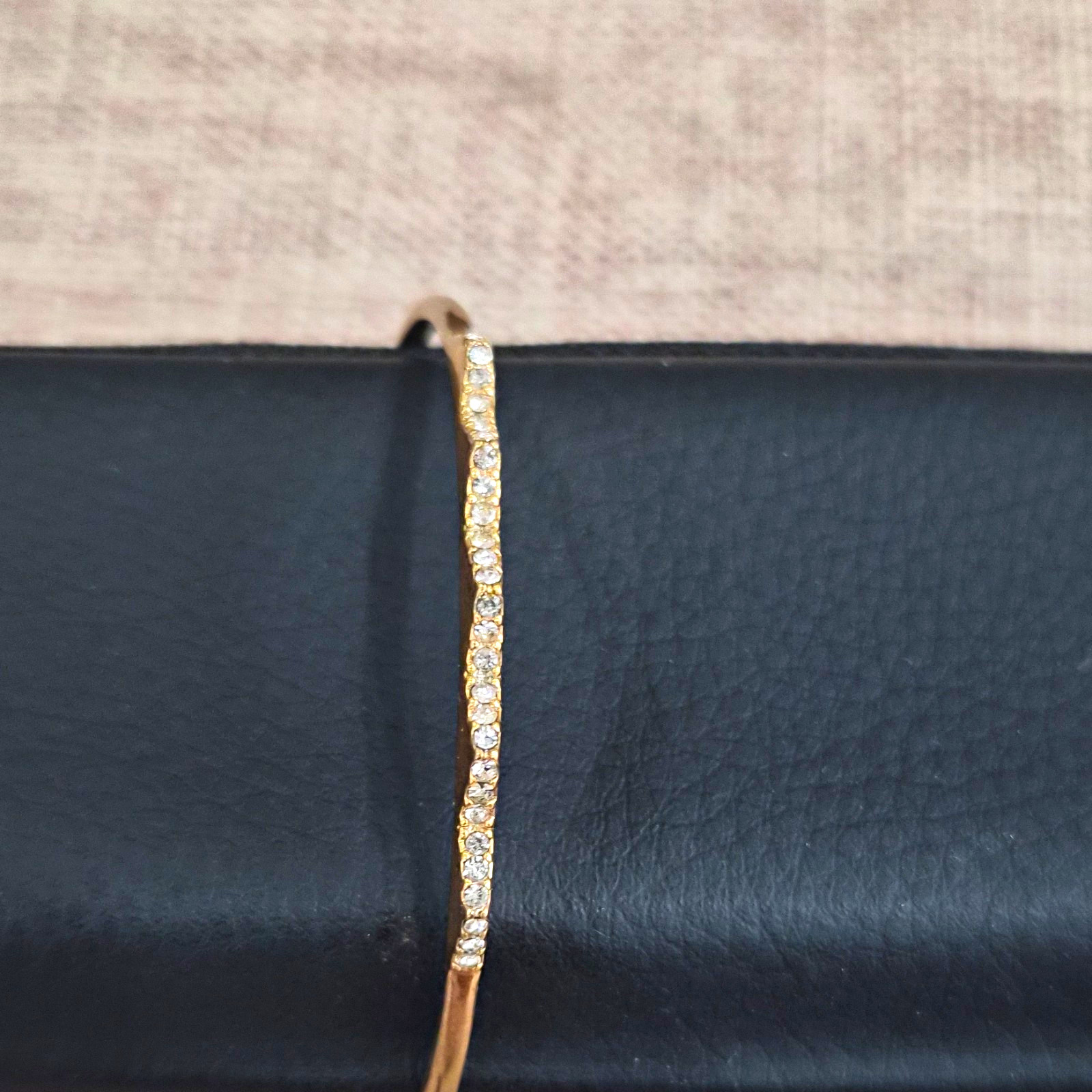 Gold Tone Pavé Round Crystal Bangle Bracelet, White/Colorless Clear Stones