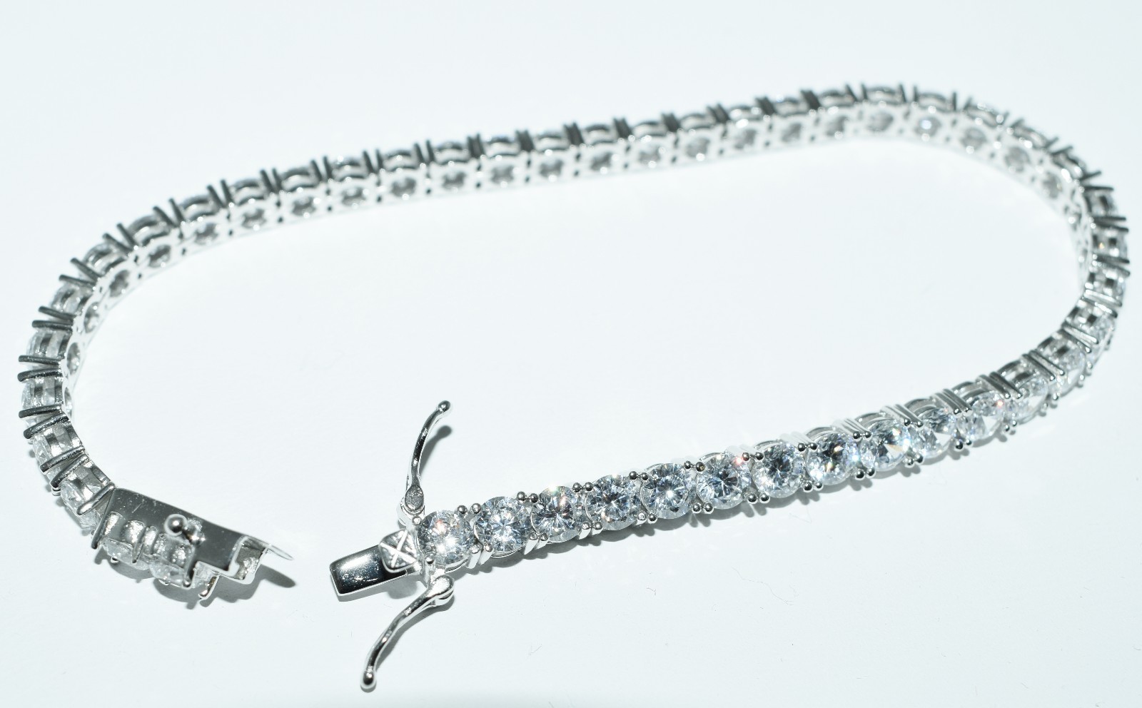 Tennis bracelet. 7 Inches Sterling silver with Cubic Zerconia. 3mm,4mm