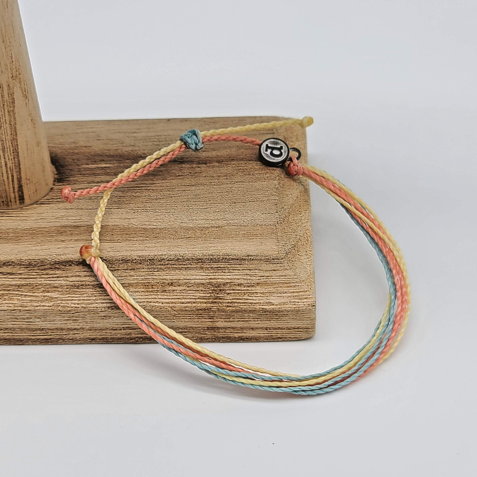 Pura Vida Original Bracelet – Butter Cream, Coral & Pacific Blue Wax-Coated Cord