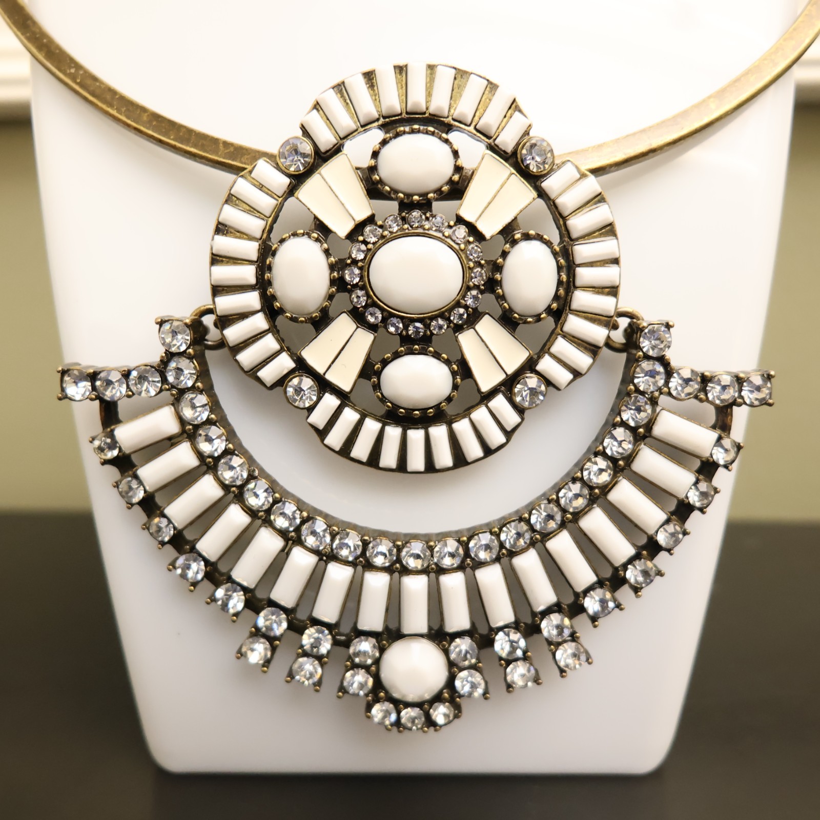 Logo Links necklace Lori Goldstein ivory crystals statement collar bronzetone