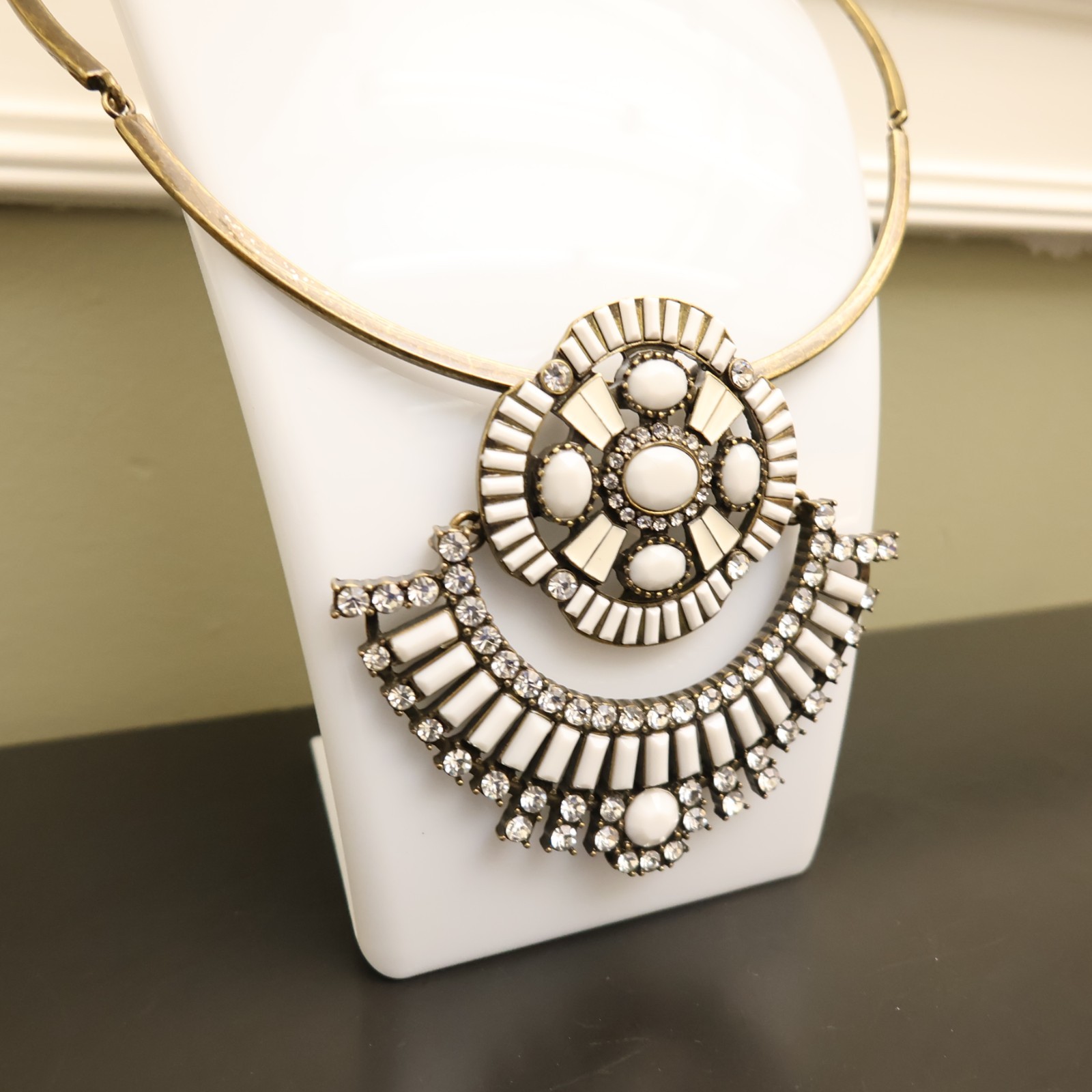 Logo Links necklace Lori Goldstein ivory crystals statement collar bronzetone