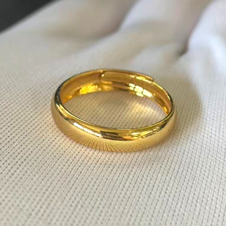 Simple Band Ring Gold-plated (NOT SURE) marked ‘ 999 ‘, Size 9 adjustable