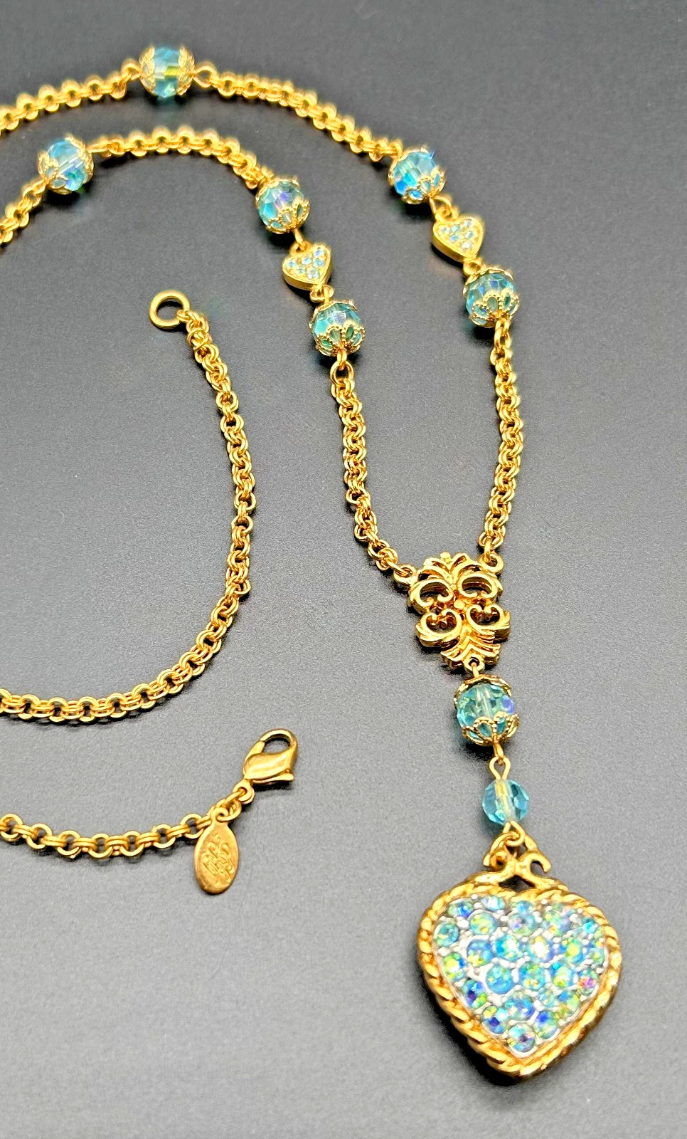 Vintage 1990s Kirks Folly Gold Tone Aurora Borealis Blue Crystal Heart Pendant