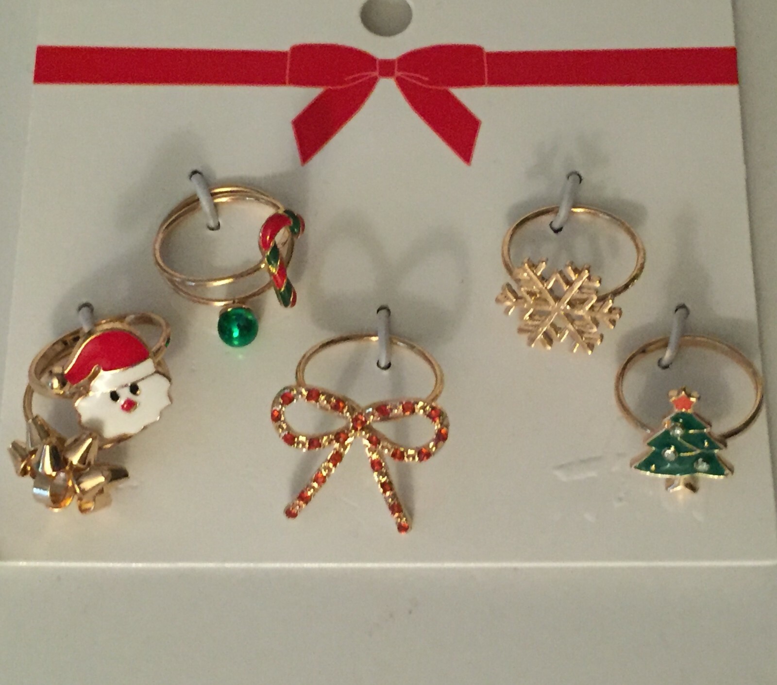 H&M 7x Christmas Rings XS/S Santa Bow Candy Cane Ornament Tree Snowflake